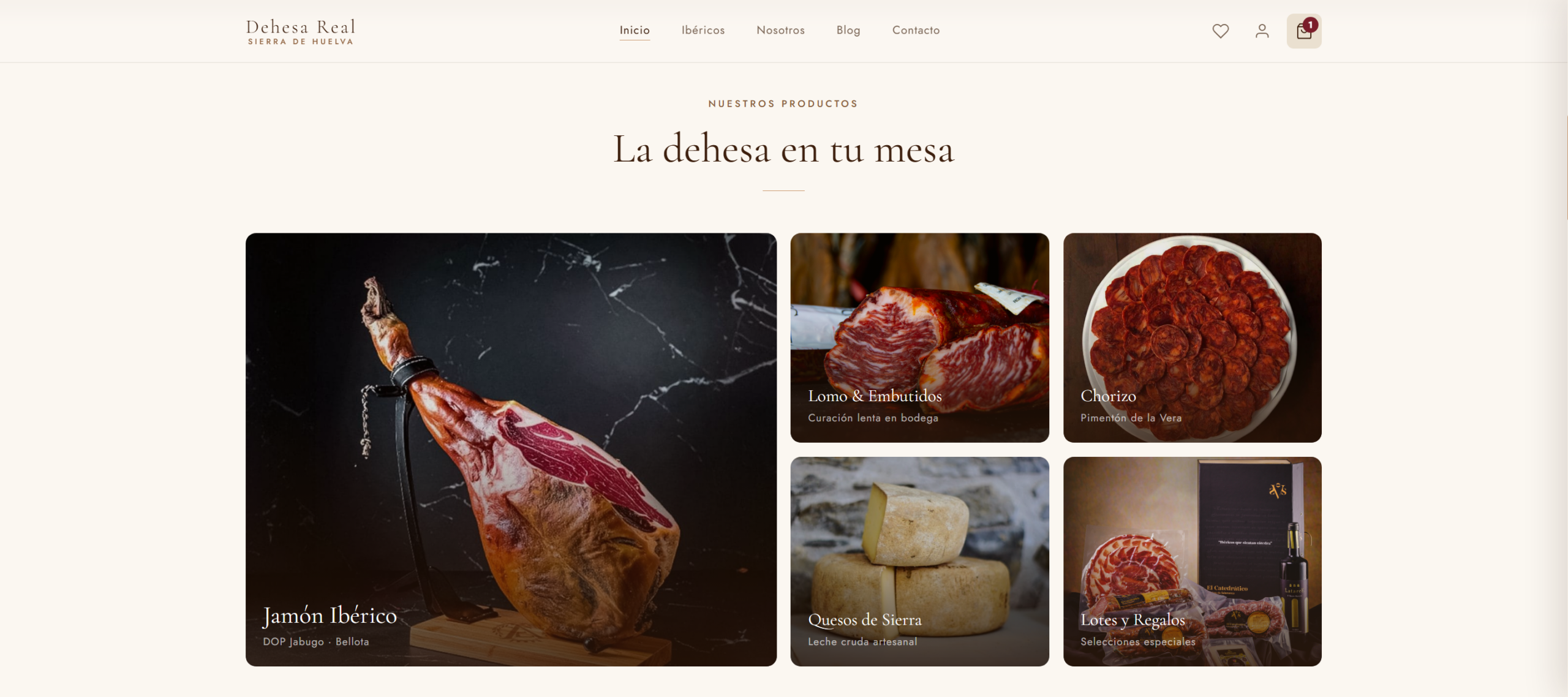 Página de inicio de Dehesa Real mostrando el hero con productos ibéricos premium de la Sierra de Huelva